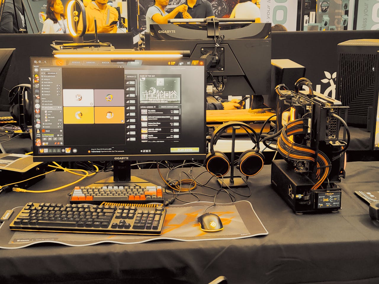 Modern gaming gear setup on display at a tech expo.